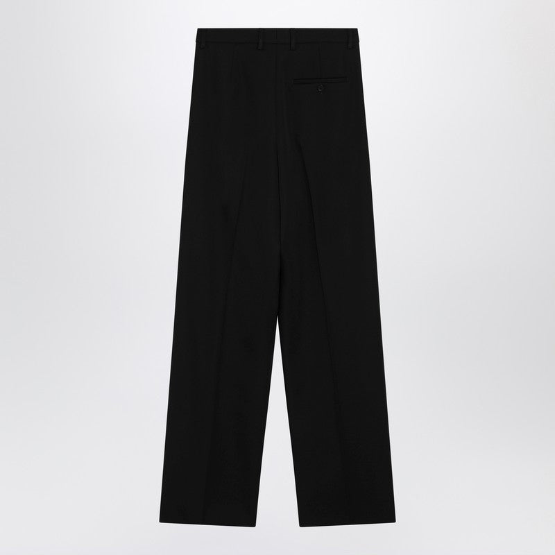 Black wool trousers