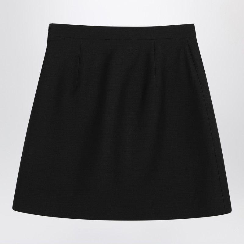 Black mini skirt with V Gold detail