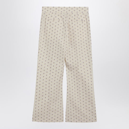 Ivory trousers with floral pattern