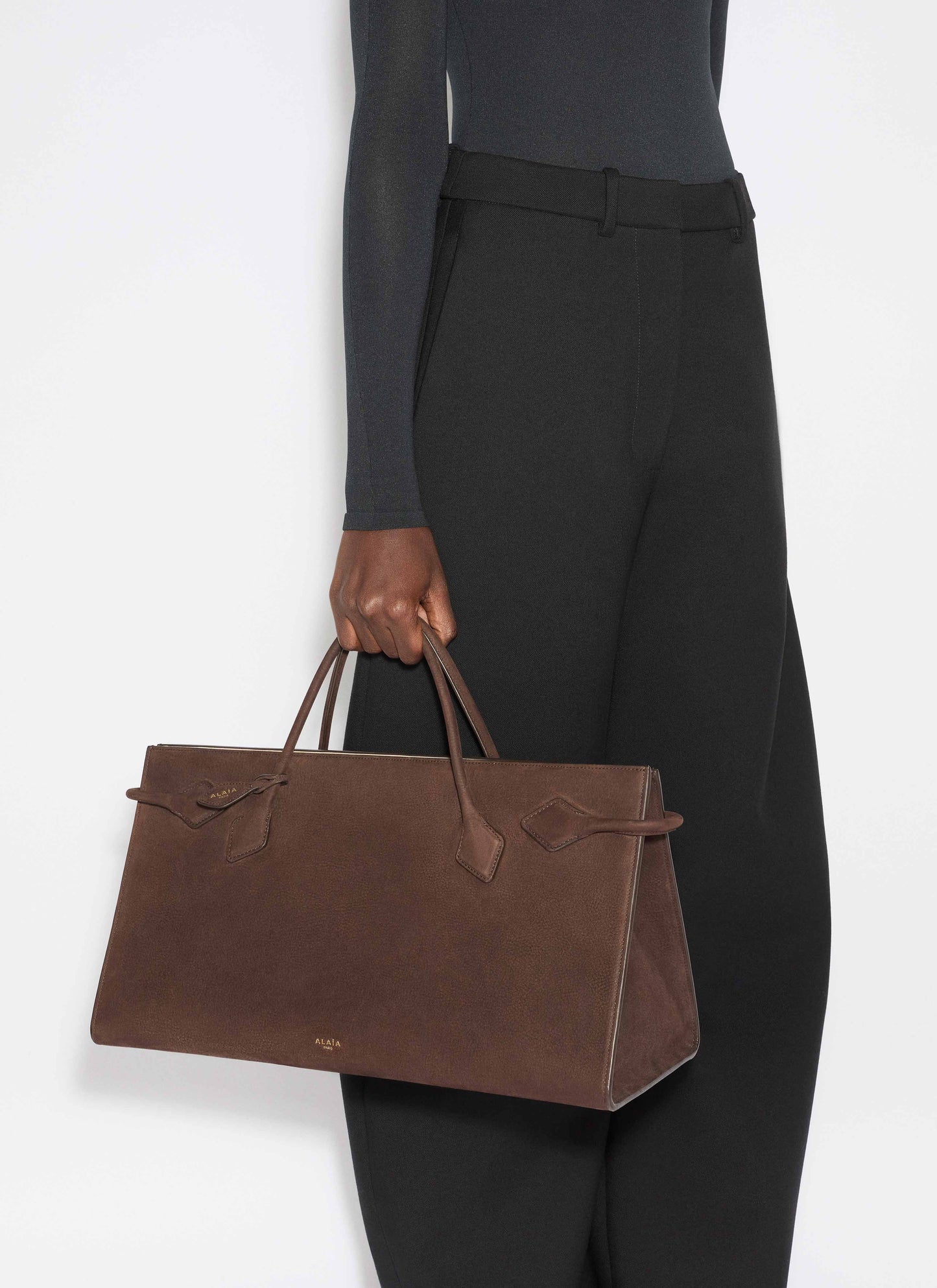 حقيبة توت من جلد الغزال من لي تيكل