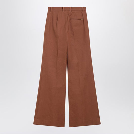 Flared cotton trousers in nougat colour