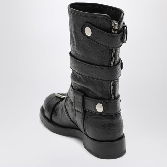 Black leather boots with straps