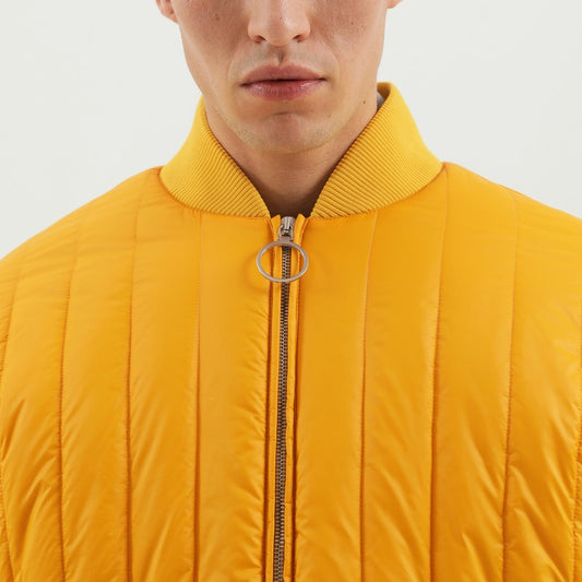 Yellow quilted down jacket