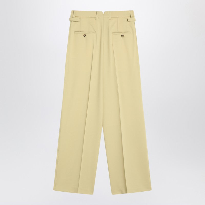 Wide lime-coloured wool trousers