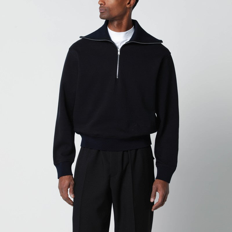 Navy blue half-zip sweatshirt