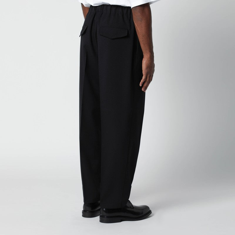 Black technical serge trousers