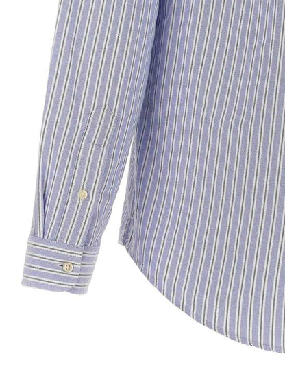 قميص بأكمام طويلة