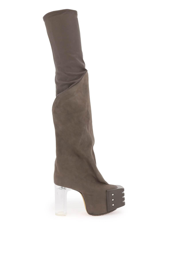 Oblique high boots with platform