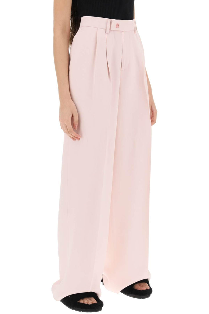 NETDRESSED | AMIRI | PANTS WITH WIDE LEG AND PLEATS